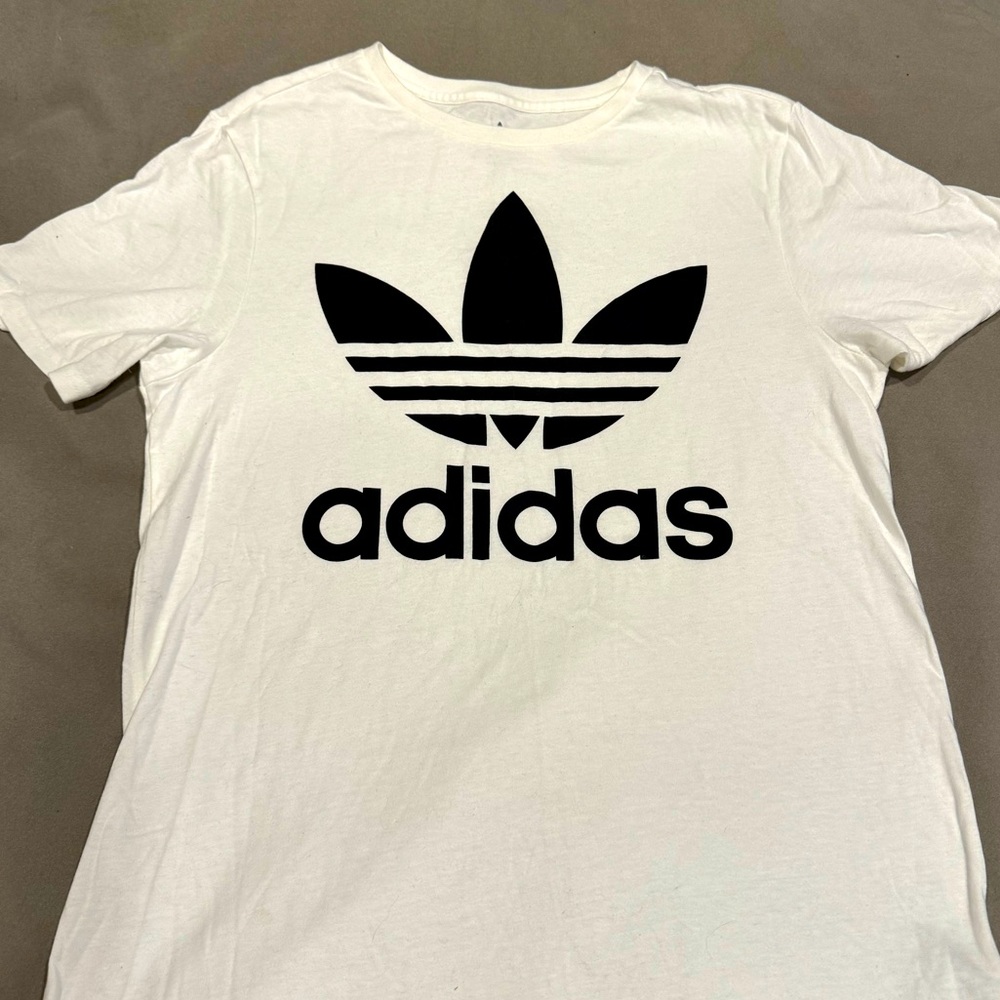 Crisp white extra large youth, Adidas T-shirt never worn. Non-smoking home.